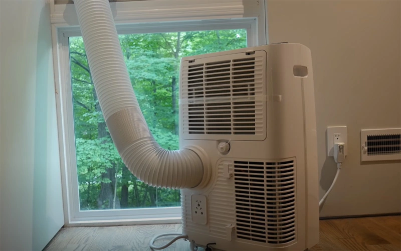 How does a portable air conditioner work